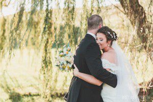 bride and groom under willow tree morningside inn