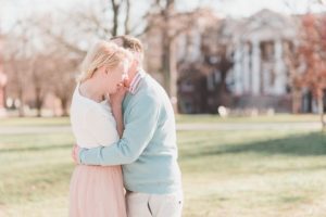 engaged couple hugging and laughing gettysburg college campus engagement